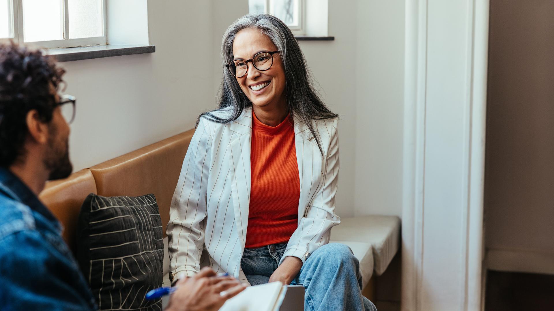 Woman manager having a casual business interview in a modern office setting