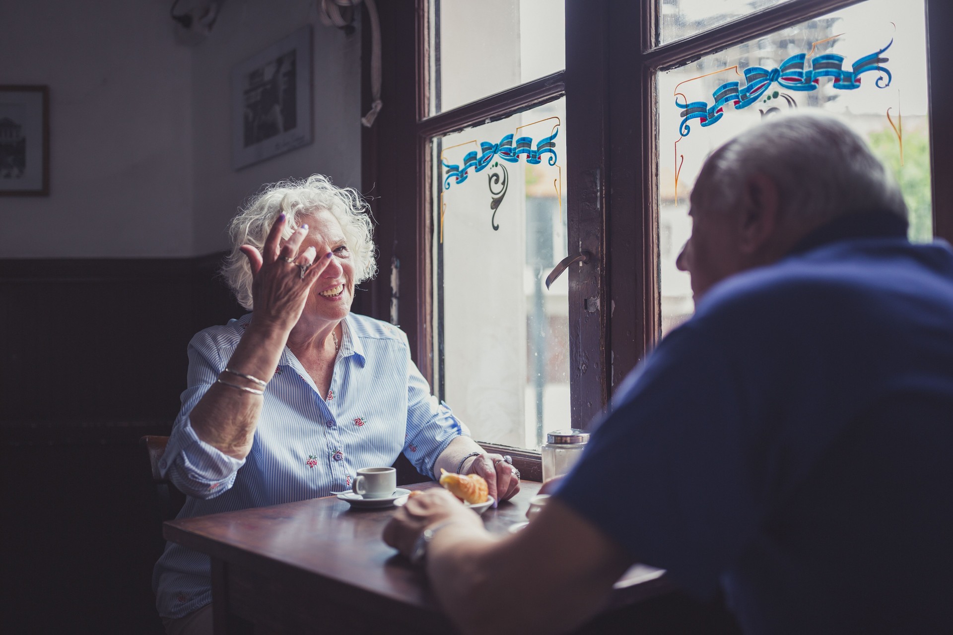 Quiet Morning Conversation in a Cafe